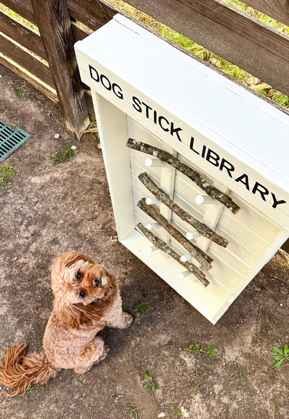 Beige Dog Stick Library close-up showing stick pegs and painted finish
