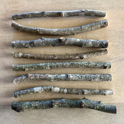 Close-up of natural wood sticks showing unique grain and knots